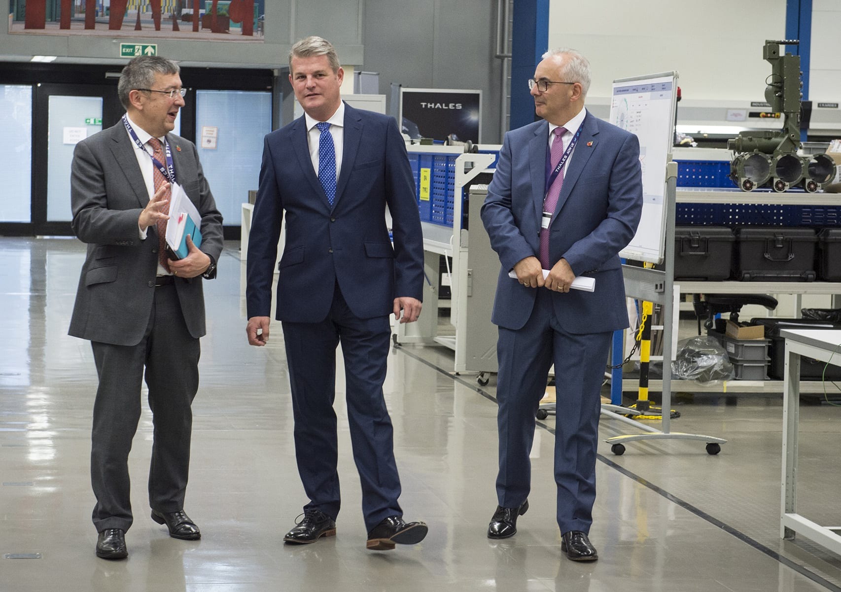 Stuart Andrew MP walking through a factory