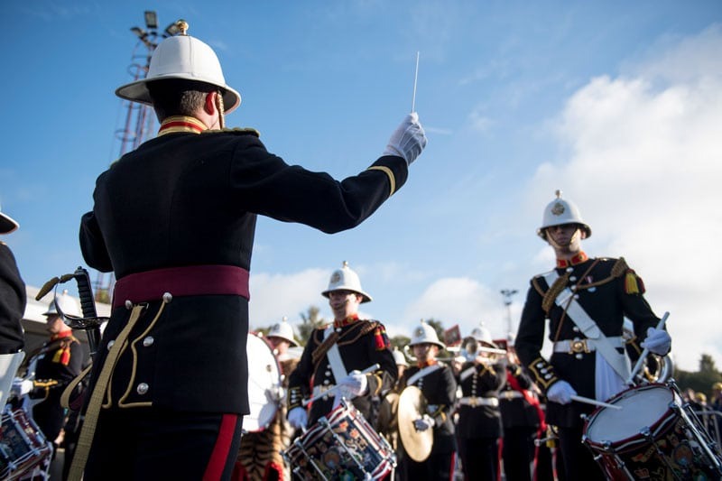 A marching band playing their instruments