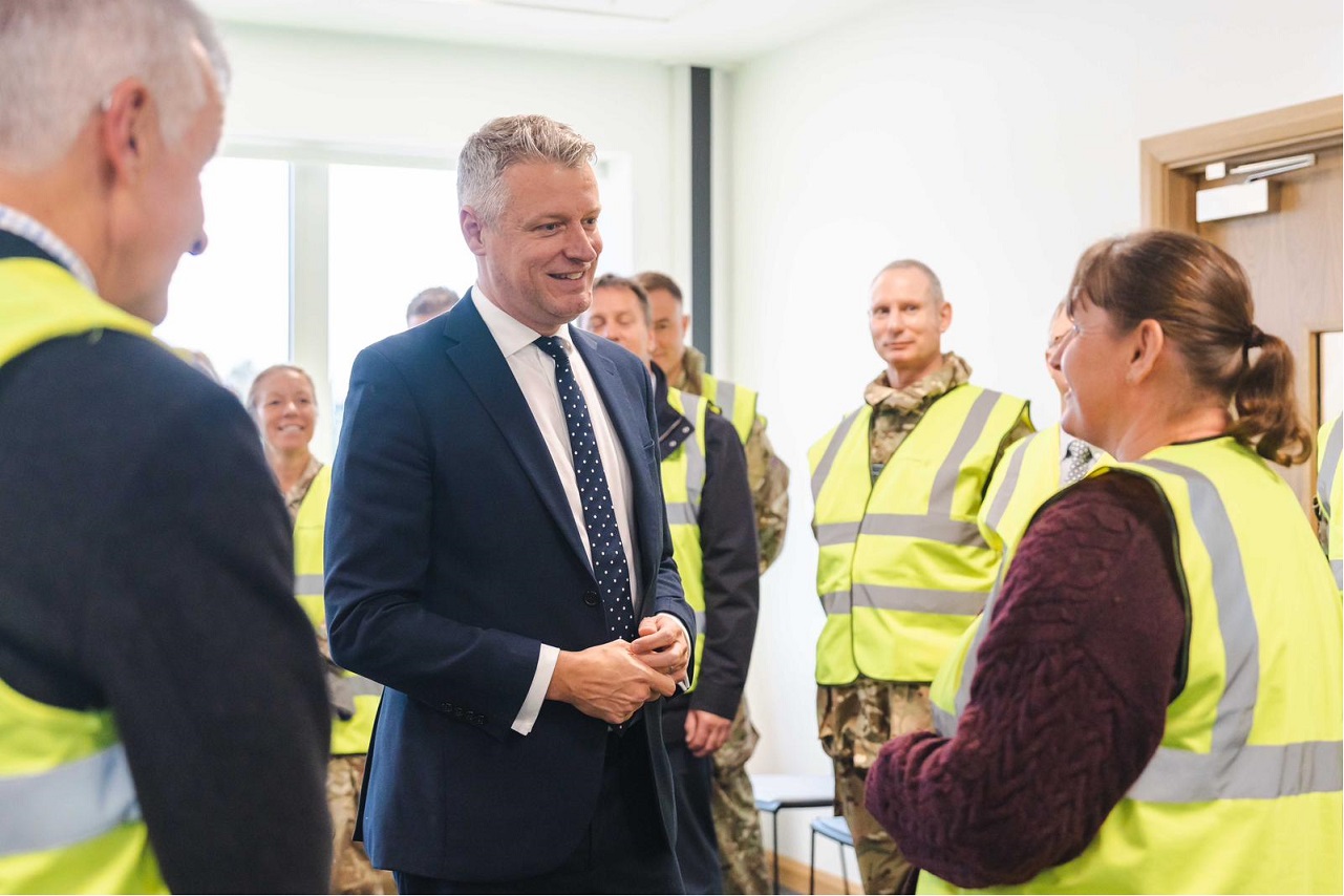 Minister for Defence Readiness and Industry talking to staff