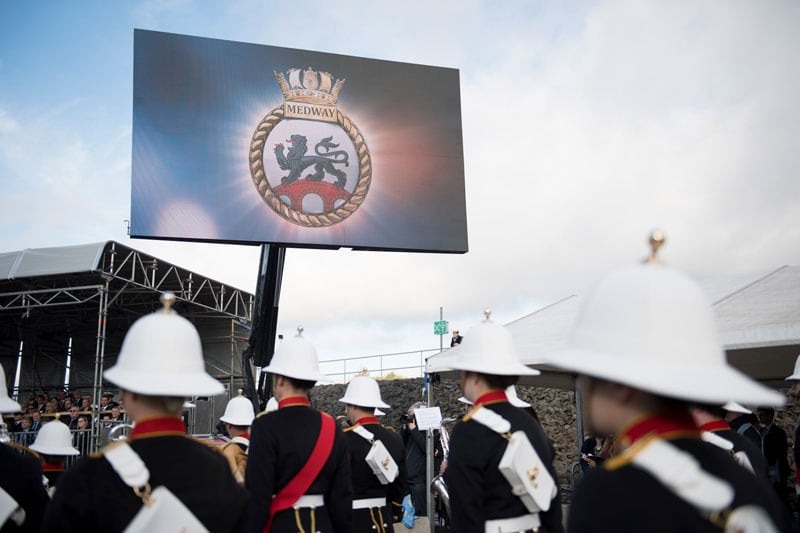 A marching band playing their instruments