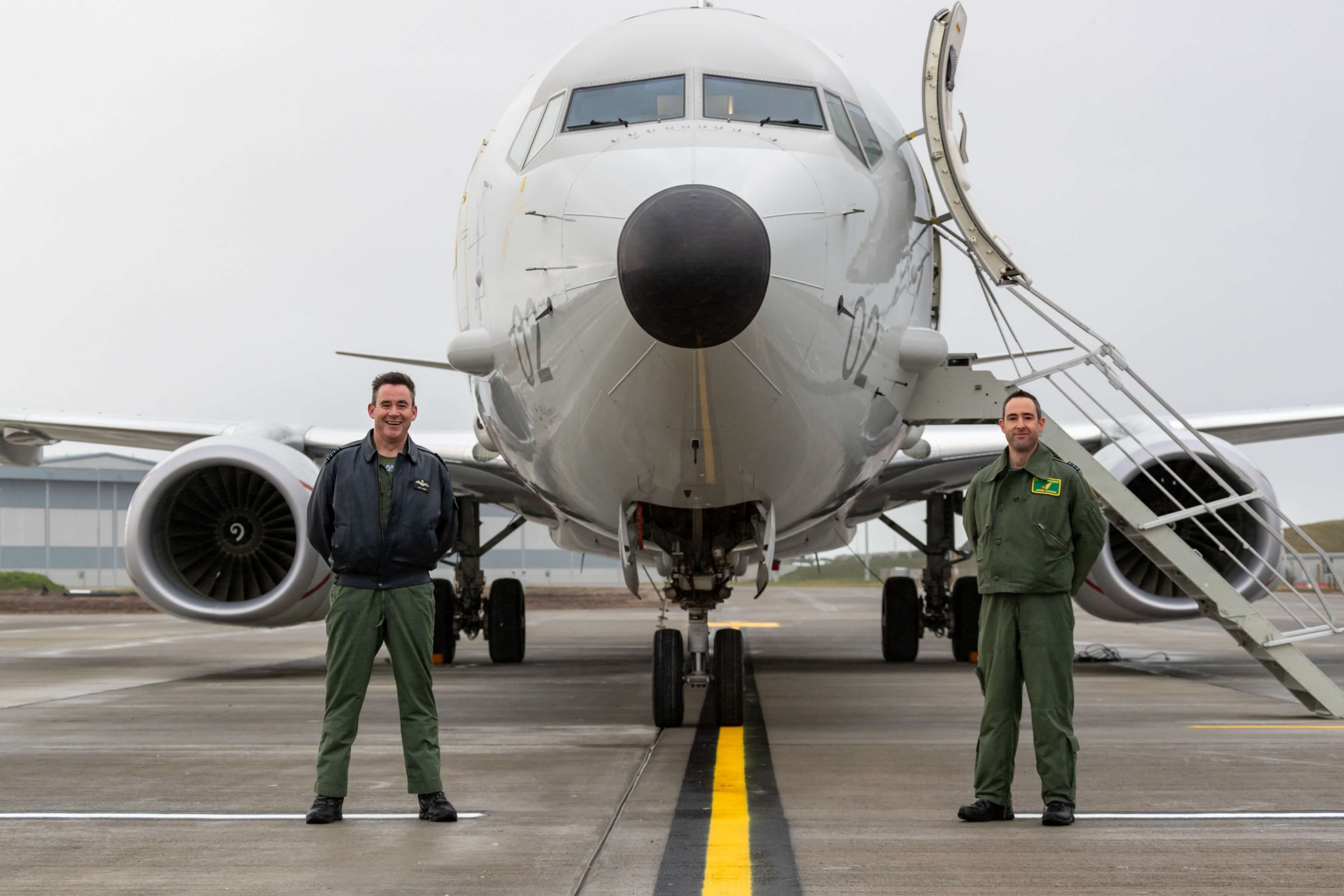 RAF Lossiemouth's Station Commander, Group Captain Chris Layden, stands alongside Officer Commanding 120 Squadron, Wing Commander James Hanson, after they received City of Elgin - the Poseidon aircraft - at Lossiemouth for the first time