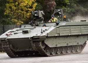 A green military armoured vehicle