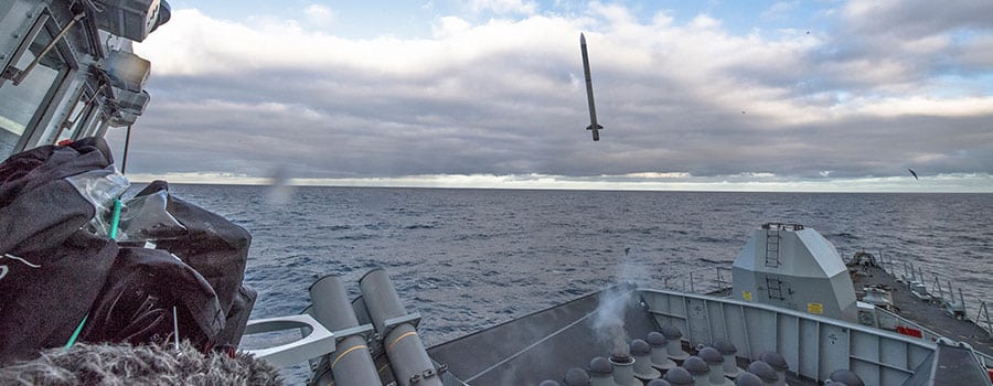 Missile firing from the deck of a ship