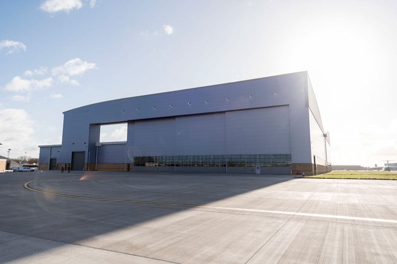 Outside shot of large RAF hangar at Brize Norton containing the Atlas aircraft