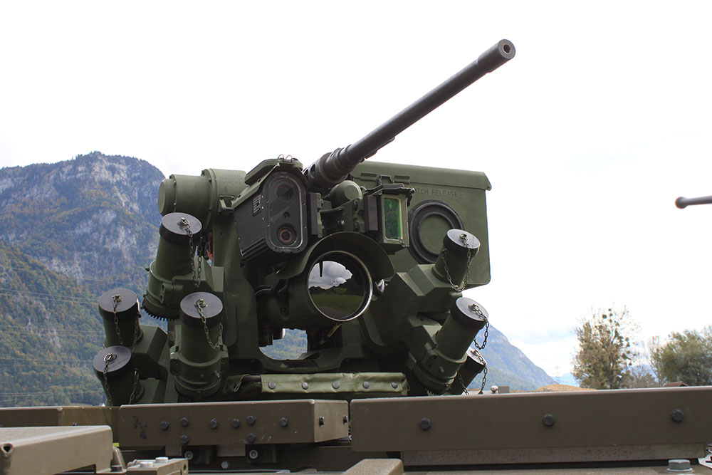 A close up photograph of the scope of a tank gun