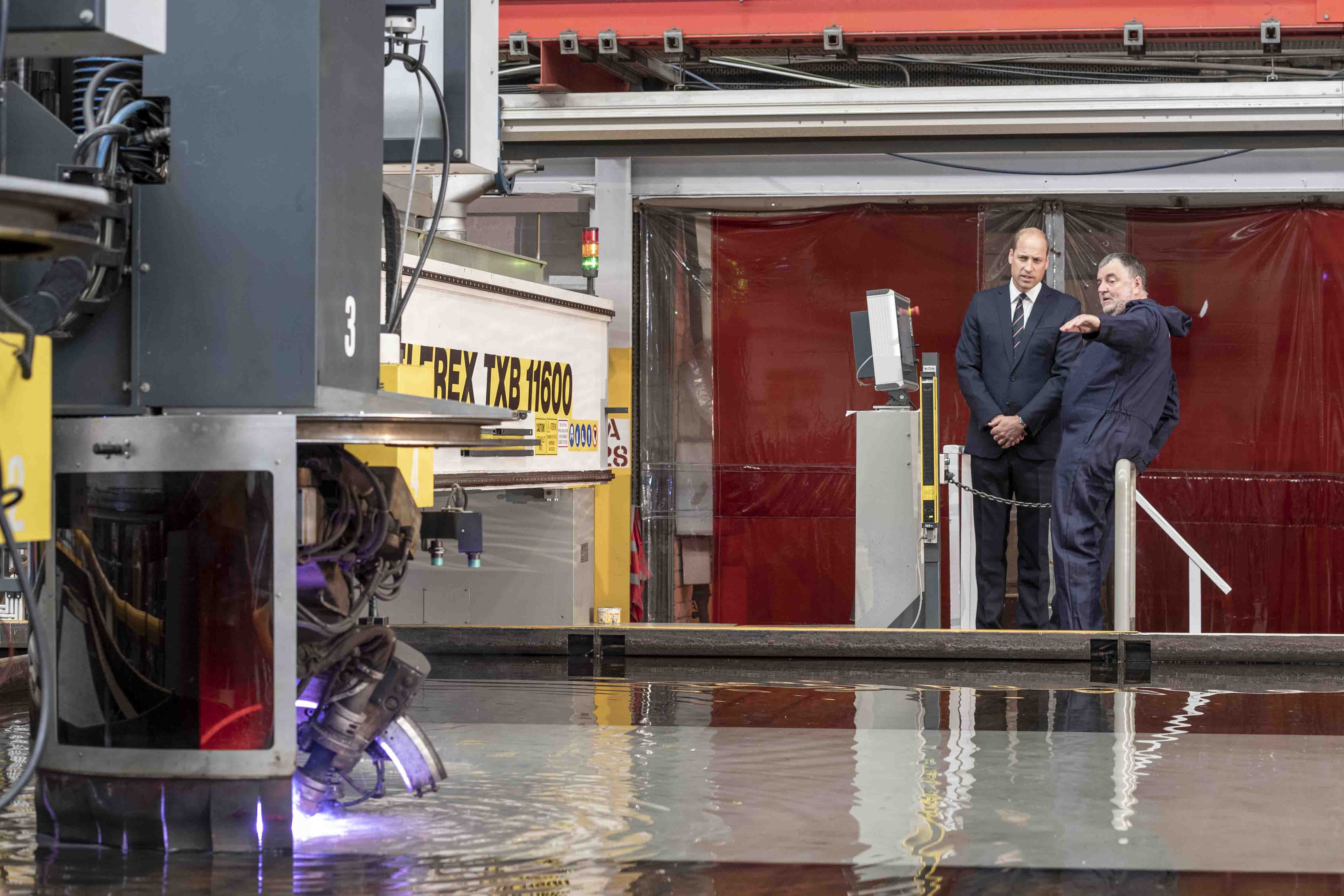 HRH Prince William performs the first steel cut for HMS Belfast