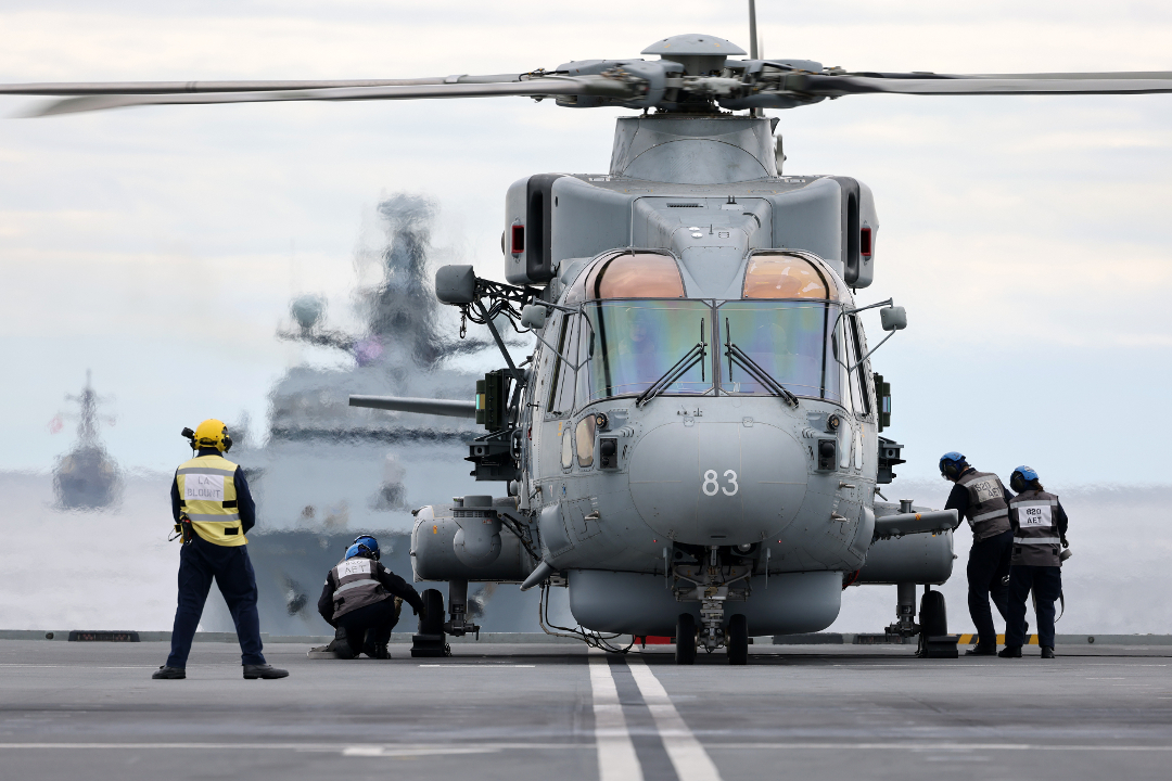 A Merlin helicopter on the deck of HMS Queen Elizabeth