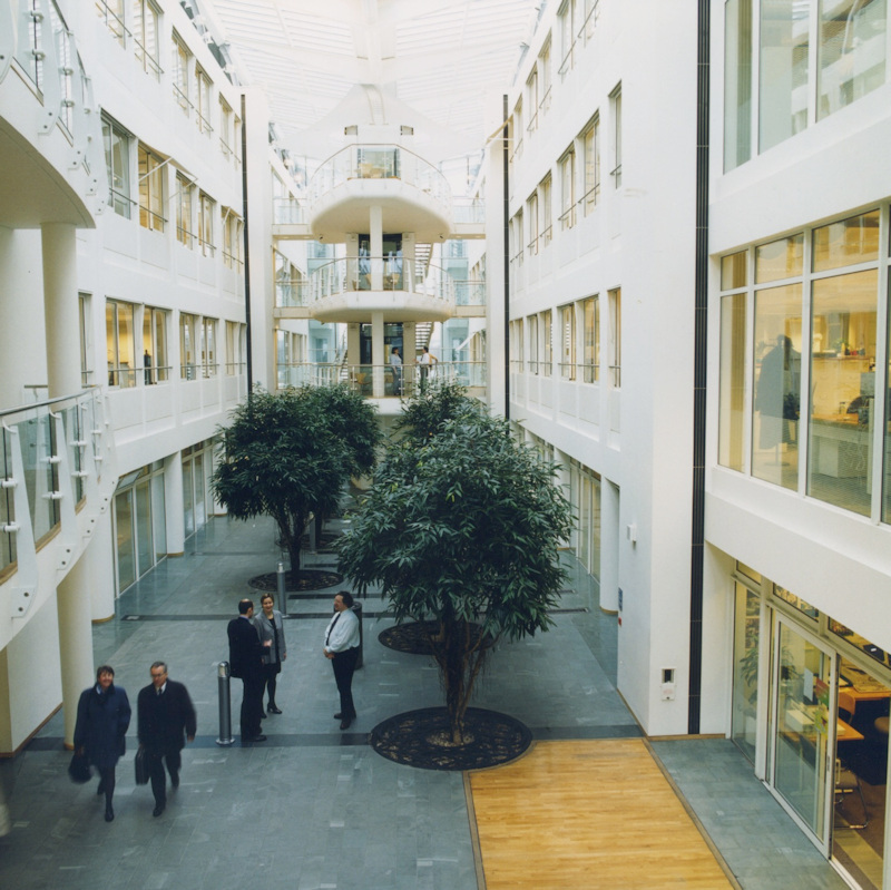 People walking through the atrium of one of the buildings at MOD Abbey Wood