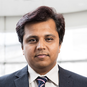 Headshot of Planning and scheduling specialist, Gaurang in suit and tie looking directly at camera