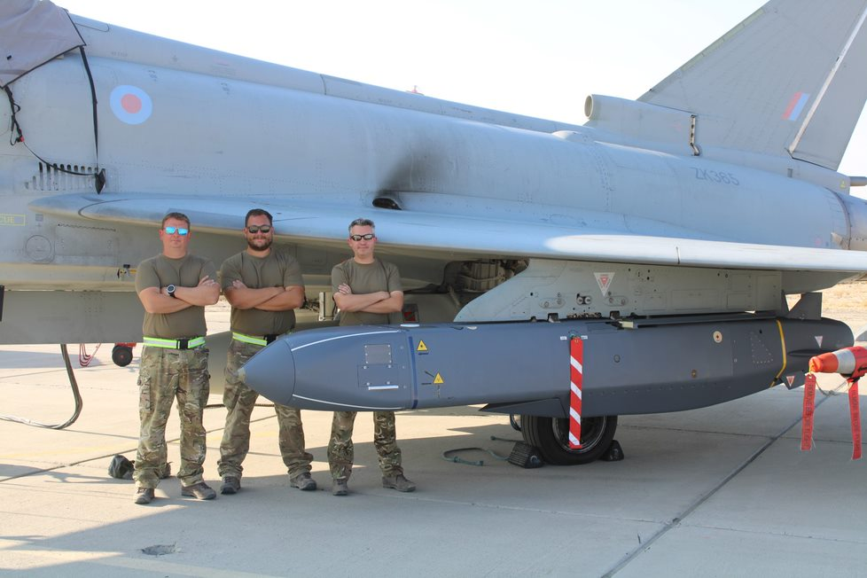 Deployed Long-Range Precision Strike Delivery Team - Chf Tech Pete “Orville” Allen, Wayne Bantick, Simon Wain with a Typhoon fighter jet