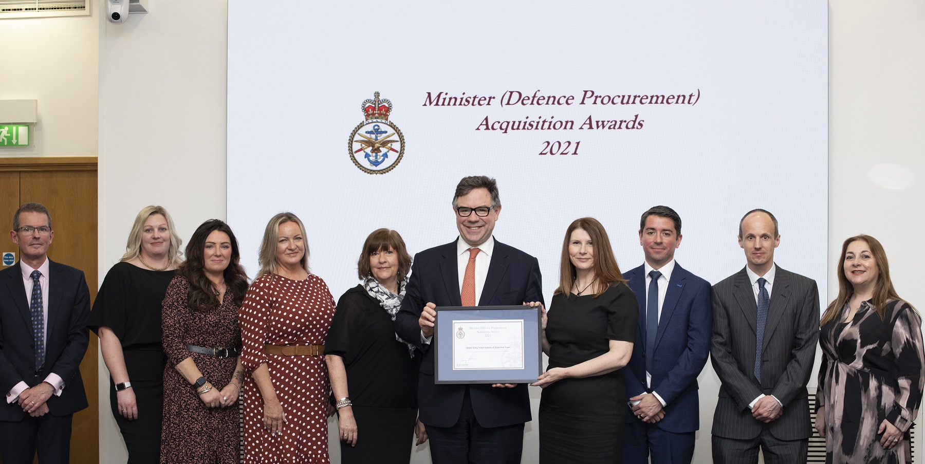 The ETCoE team accept their award from Min DP Jeremy Quin