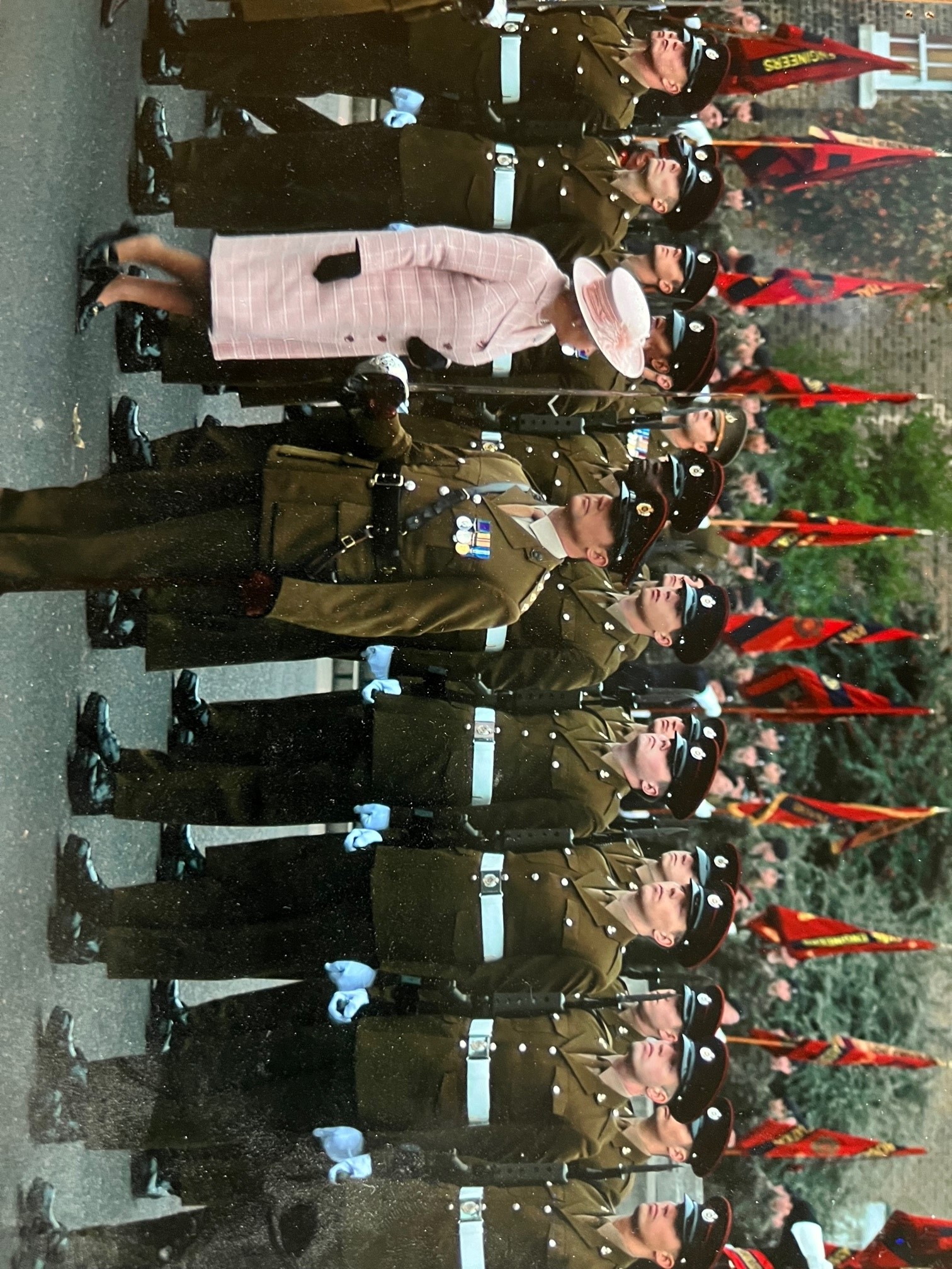 Her Majesty inspects soldiers on parade