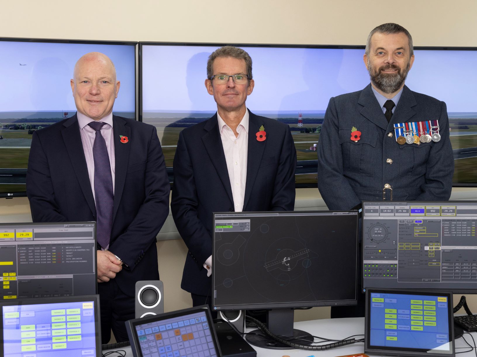 Mr Michael Stoller (CEO Aquila Air Traffic Management Services), Dr Simon Dakin, Director Integrated Battlespace at DE&S, Air Commodore Rich Jacob (Senior Responsible Owner), at RAF Shawbury