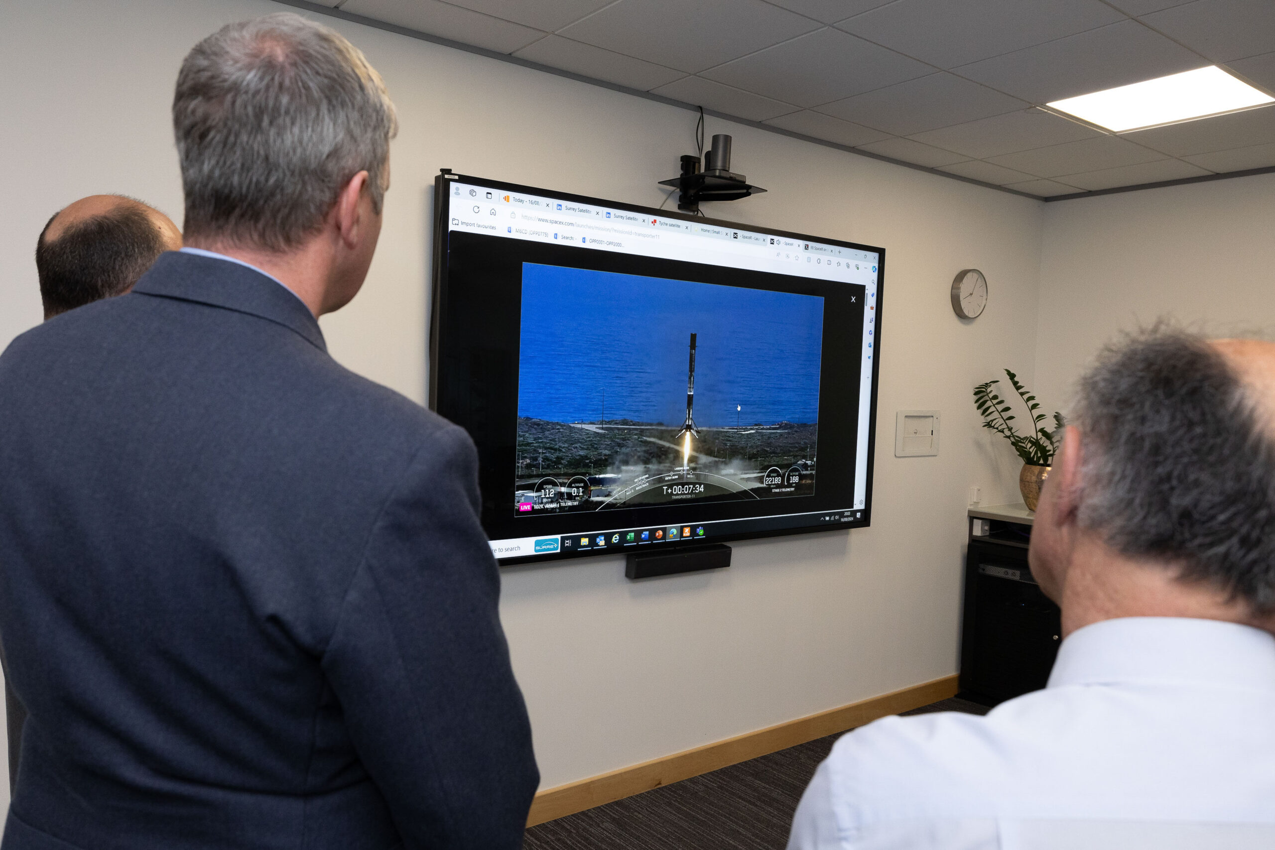 Personnel from UK Space Command, DE&S and SSTL watch live as the Tyche satellite is launched from the SpaceX Falcon 9 re-usable rocket