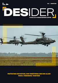 Front cover of August Desider showing two Apache AH-64E hovering above a field, providing air support during to troops during exercises.