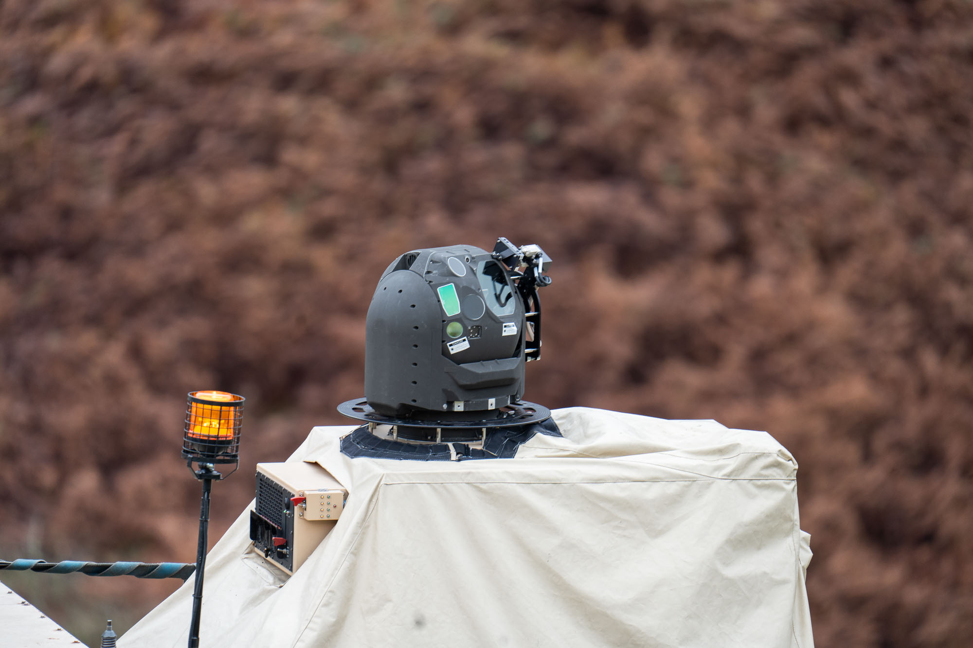 A laser demonstrator weapon mounted onto a British Army Wolfhound vehicle as part of Project Swinton