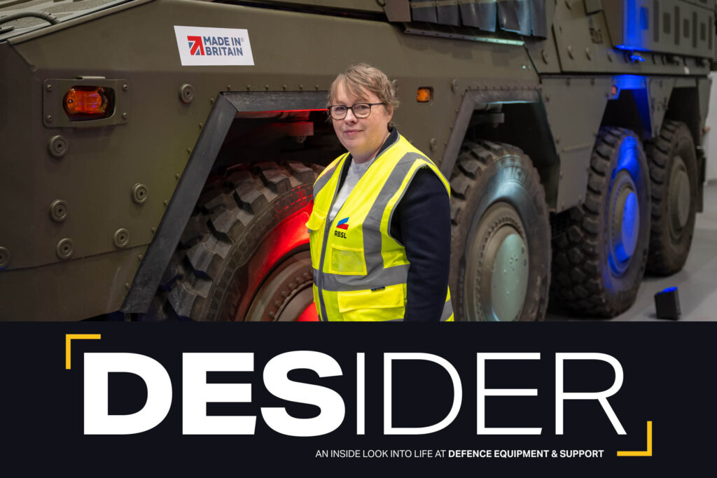 Minister for Defence Procurement and Industry Maria Eagle in front of a Boxer armoured vehicle