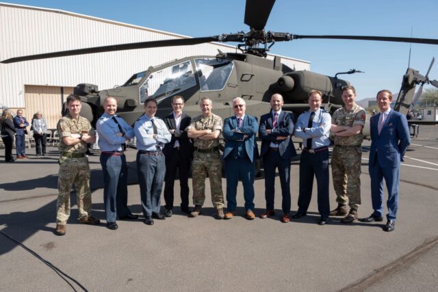 Members of DE&S, Boeing and the British Army in front of the 50th AH-64E Apache attack helicopter, which was accepted by DE&S at Boeing's manufacturing facility in Arizona