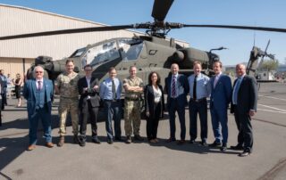 Members of DE&S, Boeing and the British Army in front of the 50th AH-64E Apache attack helicopter, which was accepted by DE&S at Boeing's manufacturing facility in Arizona