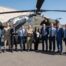 Members of DE&S, Boeing and the British Army in front of the 50th AH-64E Apache attack helicopter, which was accepted by DE&S at Boeing's manufacturing facility in Arizona