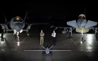 Chief of the Air Staff, Air Marshal Sir Richard Knighton, and Defence Secretary John Healey with a StormShroud drone, F-35B and Typhoon at RAF Waddington.
