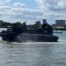 A Royal Navy Landing Craft Air Cushion (Light) (LCAC(L)) hovercraft on water